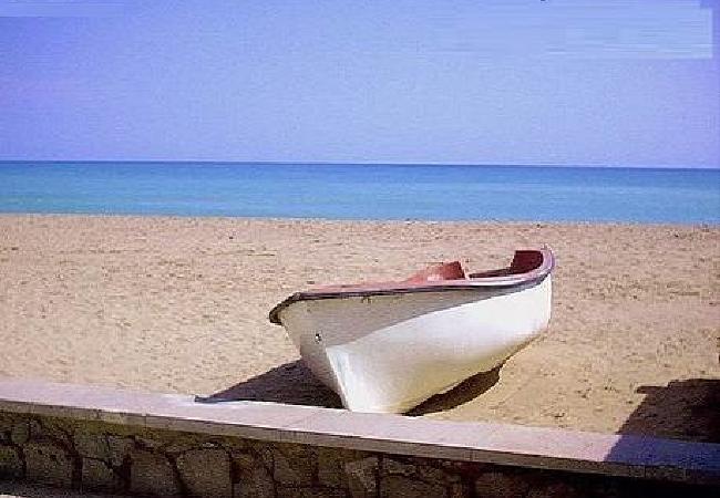 View from the promenade of a boat on Moncofa beach 