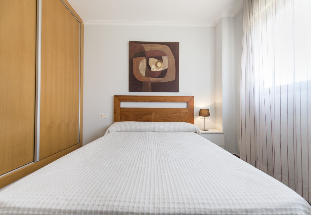 The master bedroom has a double bed, a bedside table, a lamp and bedsheets included. Its bright, airy and spacious.