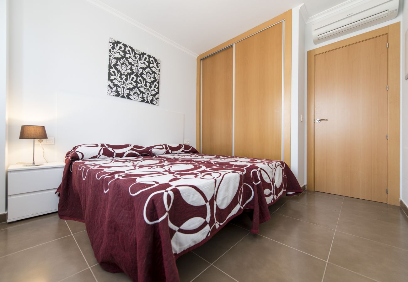 The master bedroom has a double bed, a bedside table, a lamp and bedsheets included. Its bright, airy and spacious.