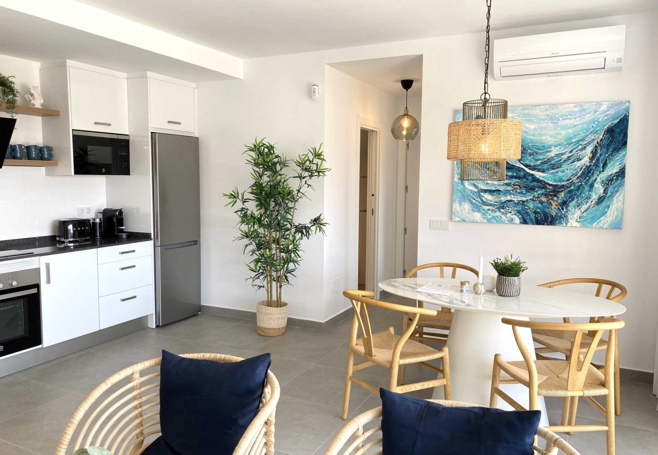 Open-plan living, dining and kitchen area for 6 people in Nerja.