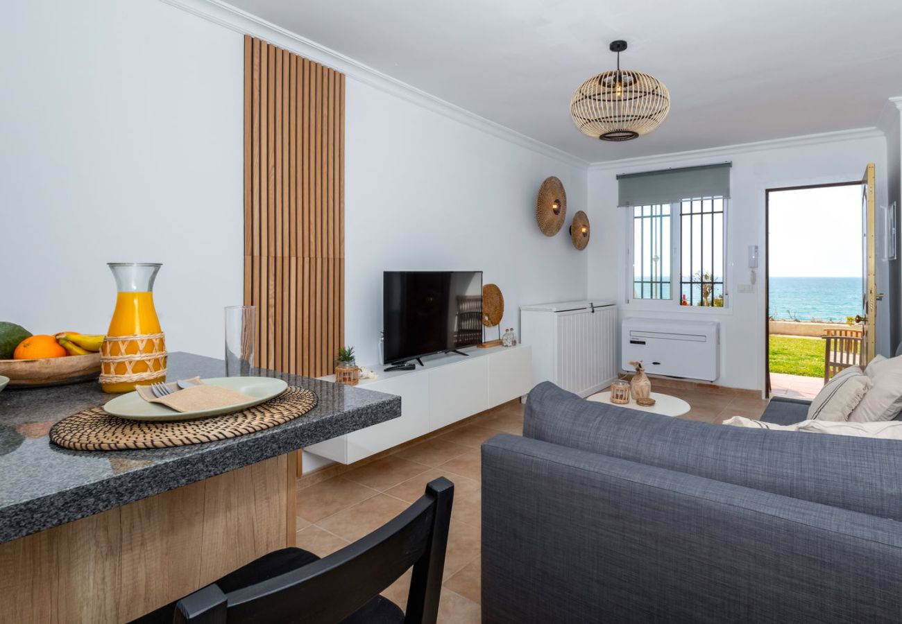 Modern living room in Arce Building with direct sea views of Torrecilla Beach in Nerja.