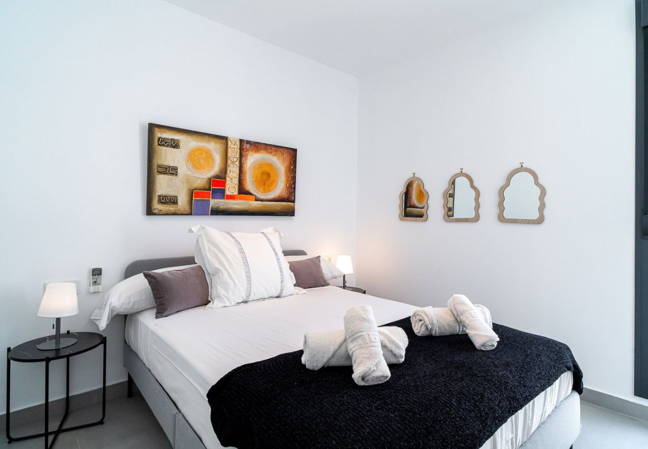 Master bedroom with double bed and high-quality mattress for a deep rest in Nerja.