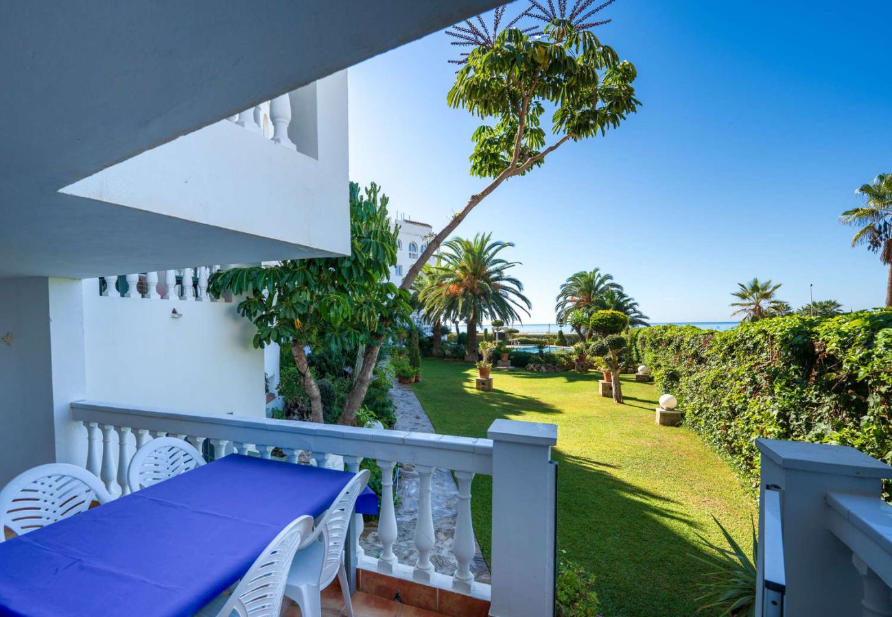 Private terrace with exclusive direct access gate to the pool and garden at Stella Maris complex