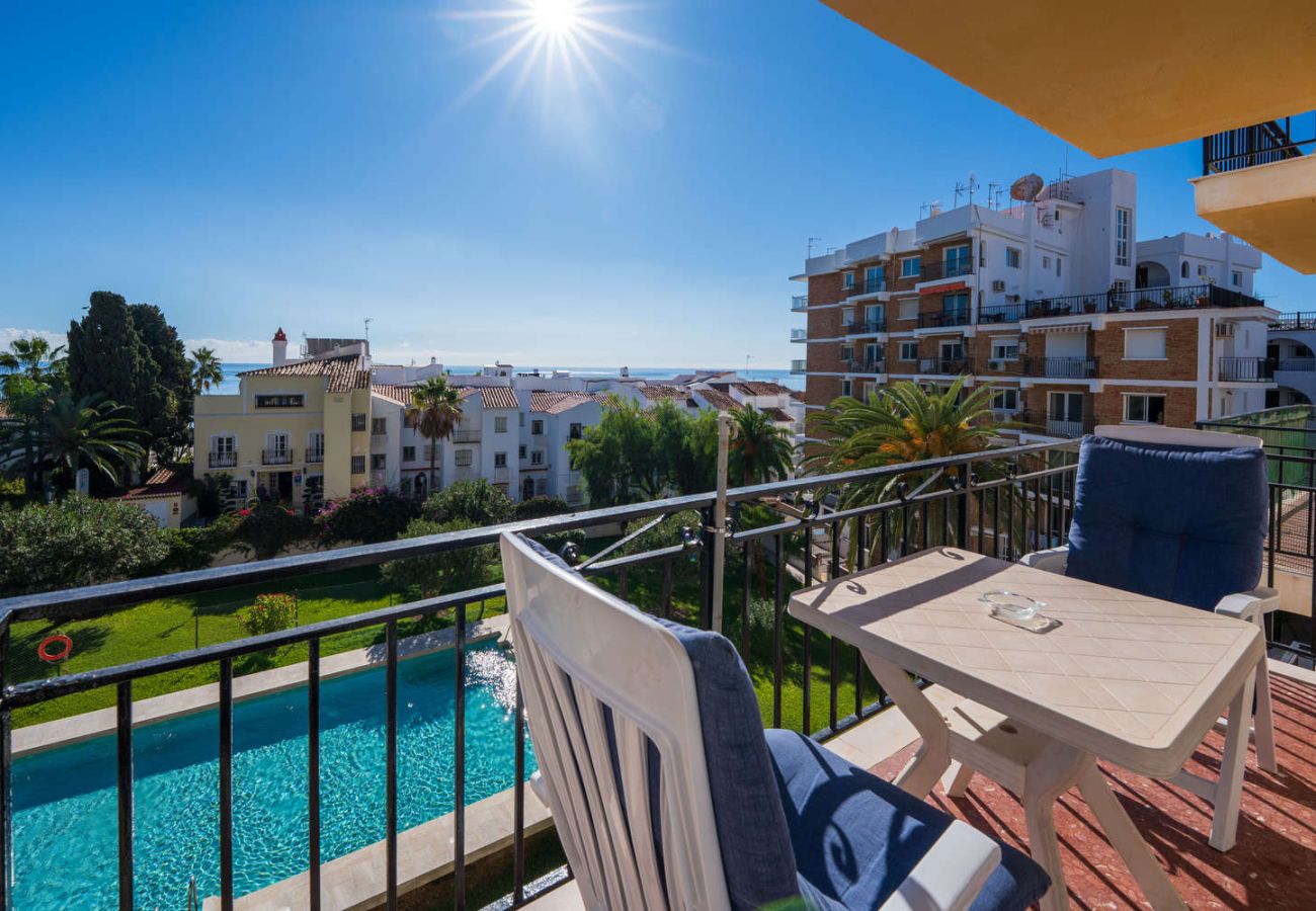 Balcony with sea views and breakfast table in the Acapulco Building.