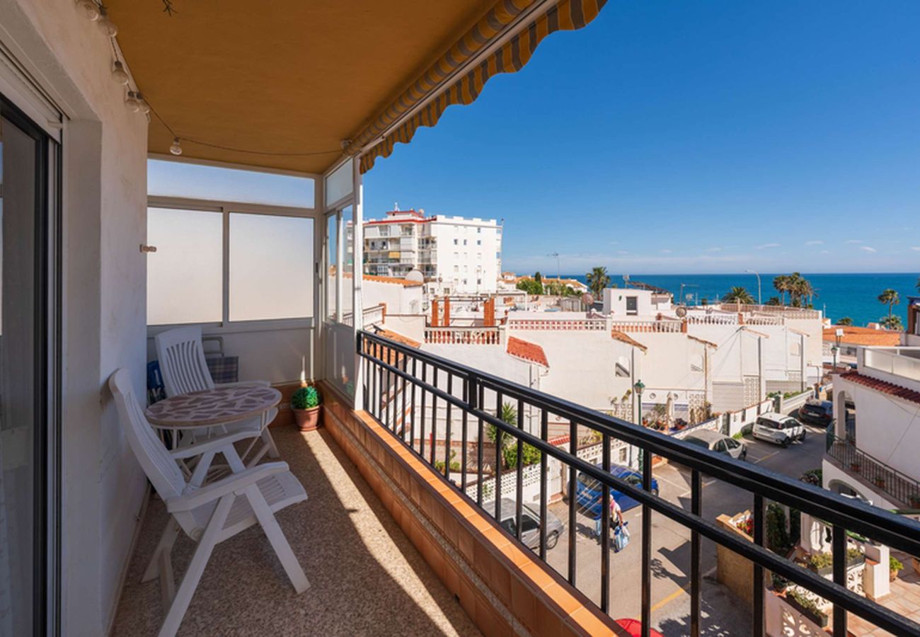 South-facing balcony with reclining chairs and sea views at Albaida II 2B, Playa Torrecilla Nerja